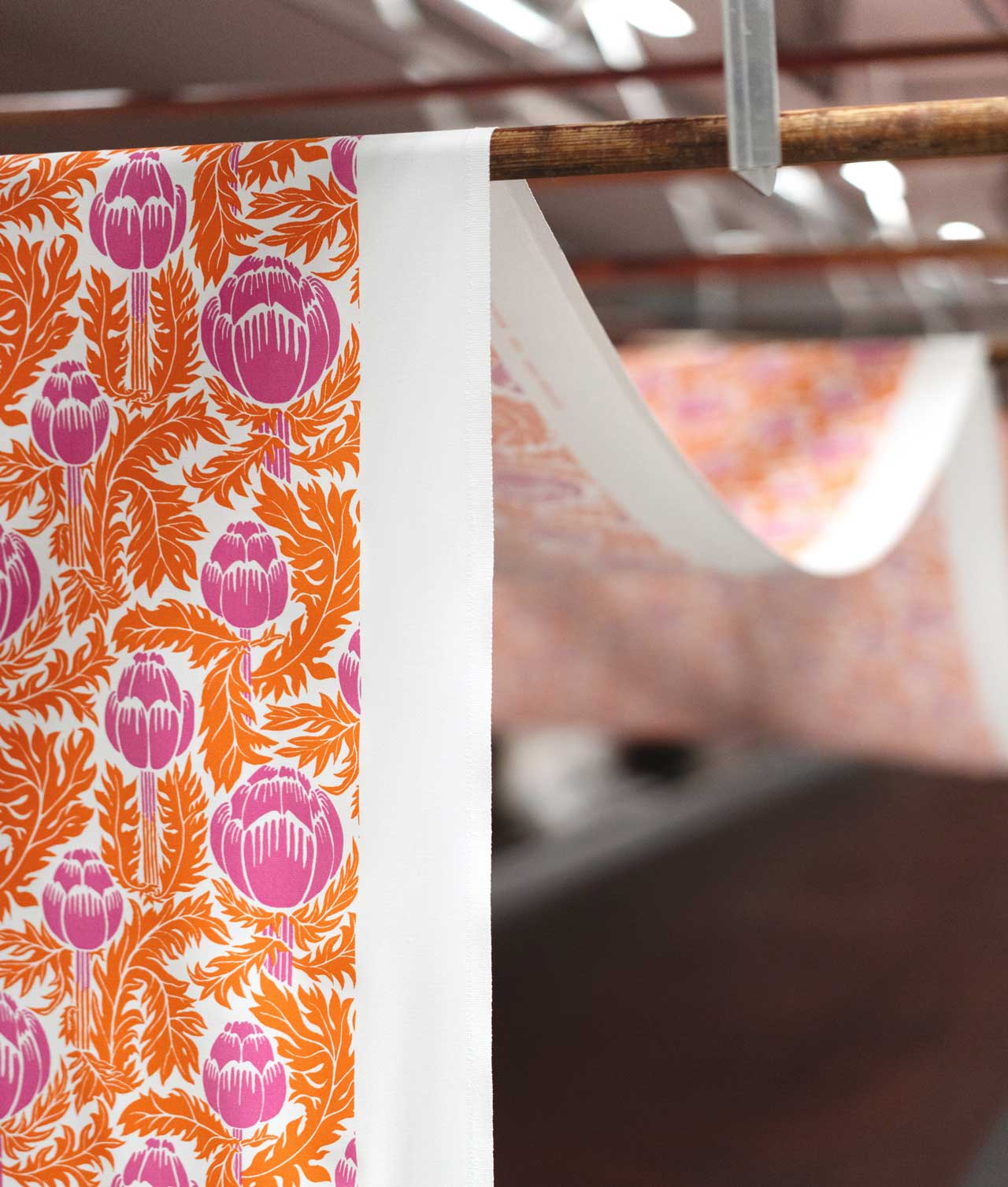 Cotton fabric "SKOCKOR I MÅNSKEN" Orange/Pink